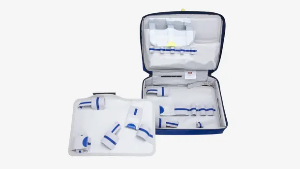 Open medical first aid kit with organized compartments and blue and white straps.