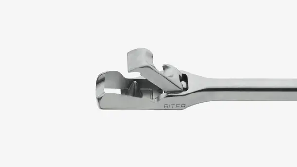 Close-up of a stainless steel surgical rongeur instrument labeled BITER.