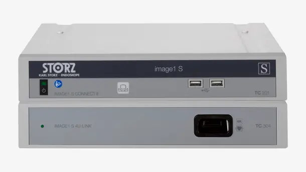 Front view of a Karl Storz IMAGE1 S endoscopy system with visible USB ports and main control panel.