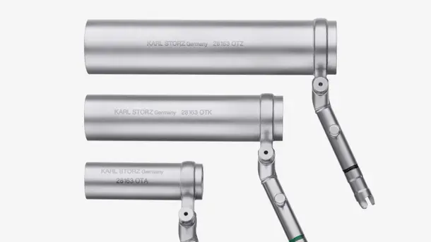 Three stainless steel surgical instruments labeled KARL STORZ, arranged horizontally.