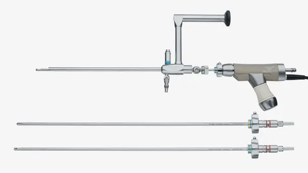 Three rigid endoscopes for medical procedures, including surgical instrumentation.