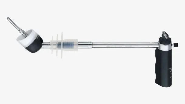 Endoscopic surgical instrument with a black handle and metallic shaft.