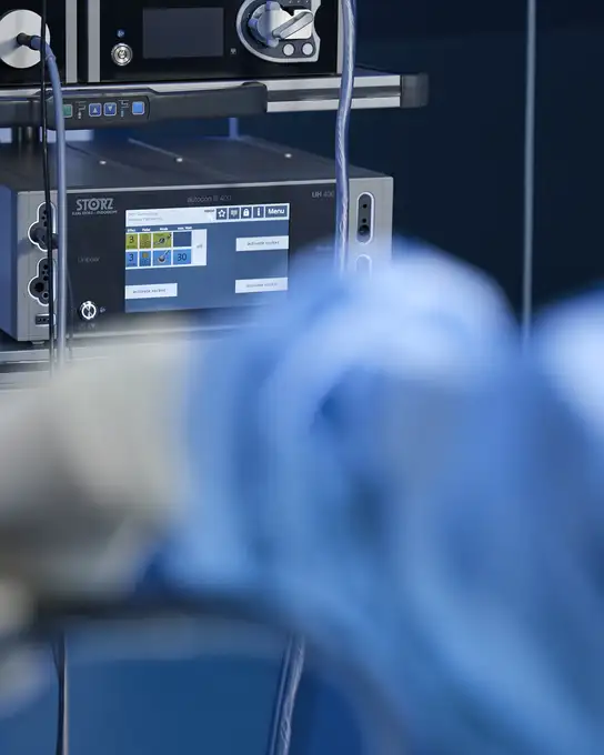 Touchscreen control panel of a medical device in a hospital or surgical setting.