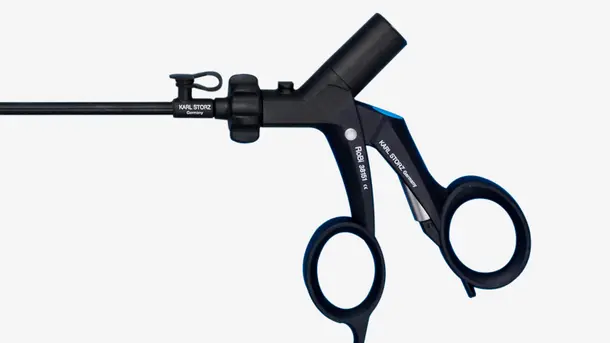 Endoscopic surgical instrument with ergonomic handle and long shaft.