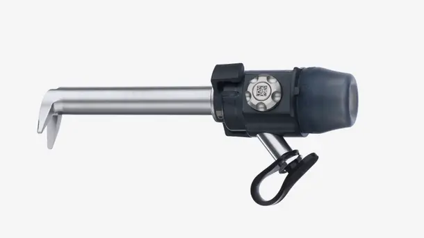 Minimally invasive surgical trocar with metal cannula and plastic handle.