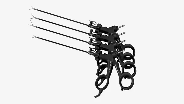 Four black laparoscopic surgical instruments with scissor-like handles and long shafts.