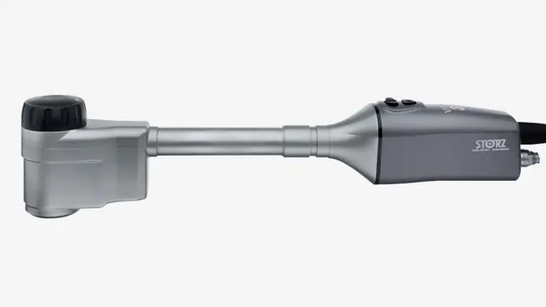 Close-up of a Karl Storz endoscope instrument with control buttons and branding visible.