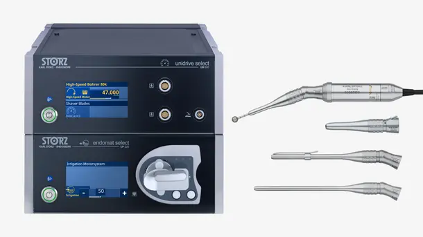 Medical endoscopic equipment with motor system and surgical handpieces displayed next to control units.