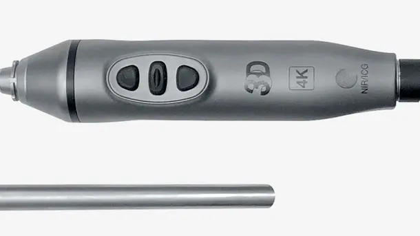 Close-up of a 3D 4K medical endoscope handle with control buttons.