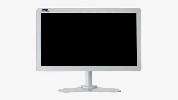 White medical display monitor with black screen on a stand.