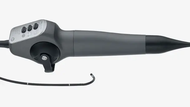Flexible medical endoscope handle with control buttons and curved tip.