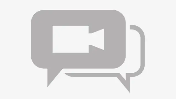 Video camera icon inside a speech bubble, representing video chat or online communication.