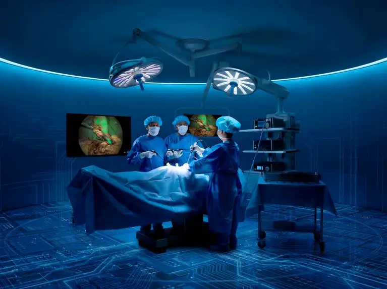 Three surgeons perform an operation using advanced medical technology in a modern operating room.