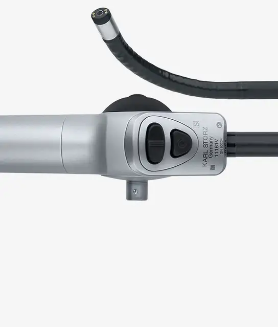 Flexible medical endoscope with control buttons and insertion tube.