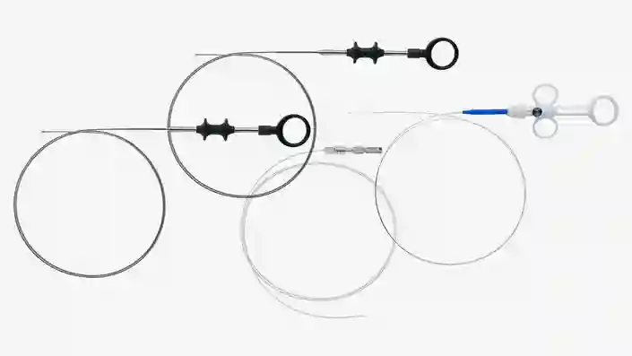 Medical stone retrieval devices with wire baskets and handles for endoscopic procedures.