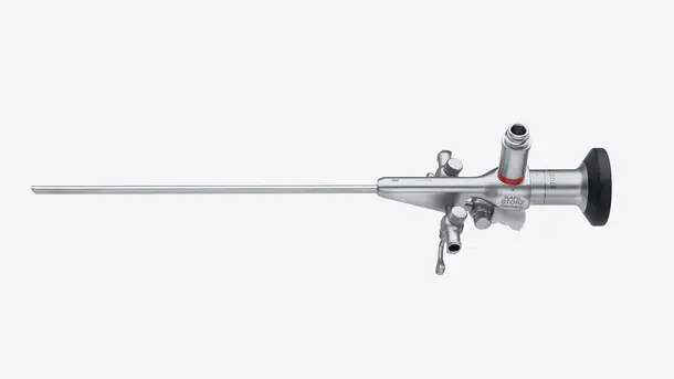 Surgical endoscope with long metal shaft and control handles.