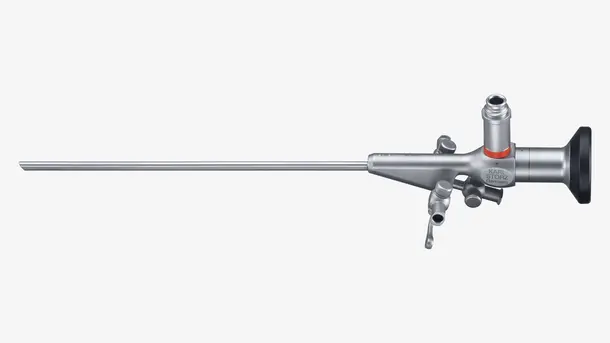 Rigid endoscope instrument with eyepiece and long metal insertion tube.